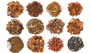 thirteen different types of woodchips and soil in circle piles on a white background