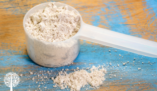 A scoop of food grade diatomaceous earth.