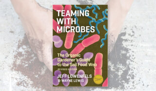 Graphic showing the cover of 'TEAMING WITH MICROBES', an informative book about testing your soil ph.